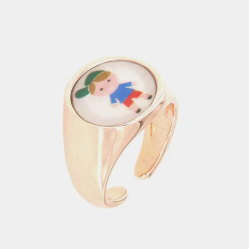 Metal Ring with child symbol embellished with colored enamels