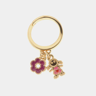 Anello in Metallo con pendenti impreziositi da smalti colorati a forma di bimba e fiore viola - BYSIMON gioielli