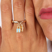 Anello in Metallo con pendenti impreziositi da smalti colorati a forma di lucchetto e casa con cuore