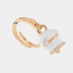Anello in Metallo con campanella portafortuna pendente impreziosita da smalto bianco e cristalli