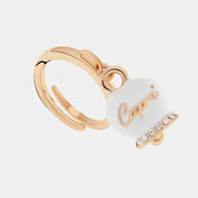 Anello in Metallo con campanella portafortuna pendente impreziosita da smalto bianco e cristalli