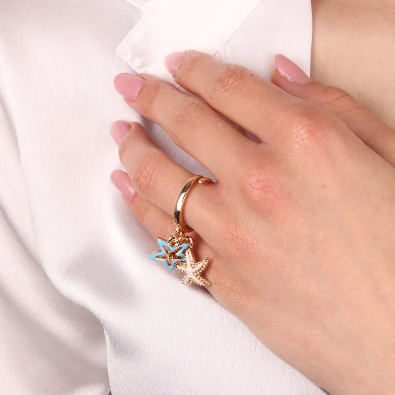 Anello in Metallo con stelle marine e cuore - BYSIMON gioielli