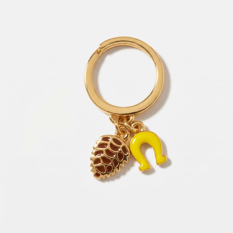 Anello in Metallo con pigna e ferro di cavallo in smalto giallo - BYSIMON gioielli