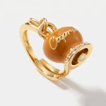Anello in Metallo con campanella arancione scritta capri