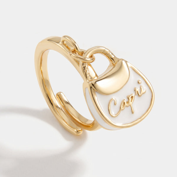 Anello in Metallo con borsa bianca scritta capri - BYSIMON gioielli