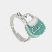 Anello in Metallo con borsa verde acqua scritta capri