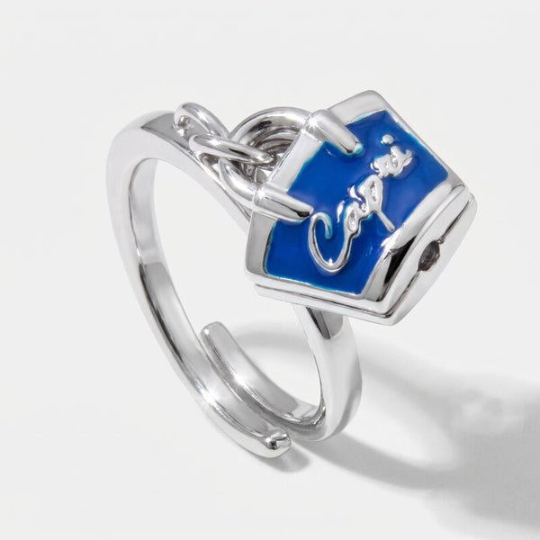 Anello in Metallo con borsa blu scritta capri - BYSIMON gioielli
