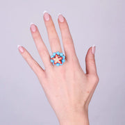 Anello in Metallo con sfere turchesi e stella marina rossa