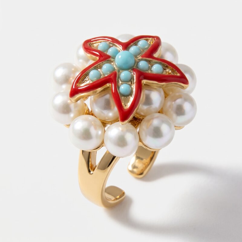 Anello in Metallo con sfere bianche e stella marina rossa - BYSIMON gioielli
