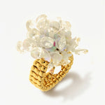 Orecchini elastici in metallo placcato oro con paillettes crystal bianche - BYSIMON