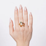 Anello in Metallo donna in metallo a forma di fiore con cristalli oleografici colorati,