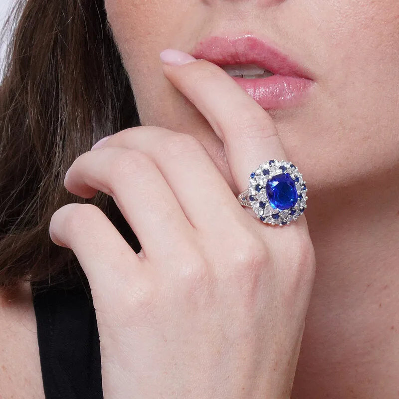 Anello in Metallo corona zirconi e zircone blu