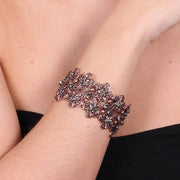 Bracciale in Metallo elastico, con fiori e cristalli verdi