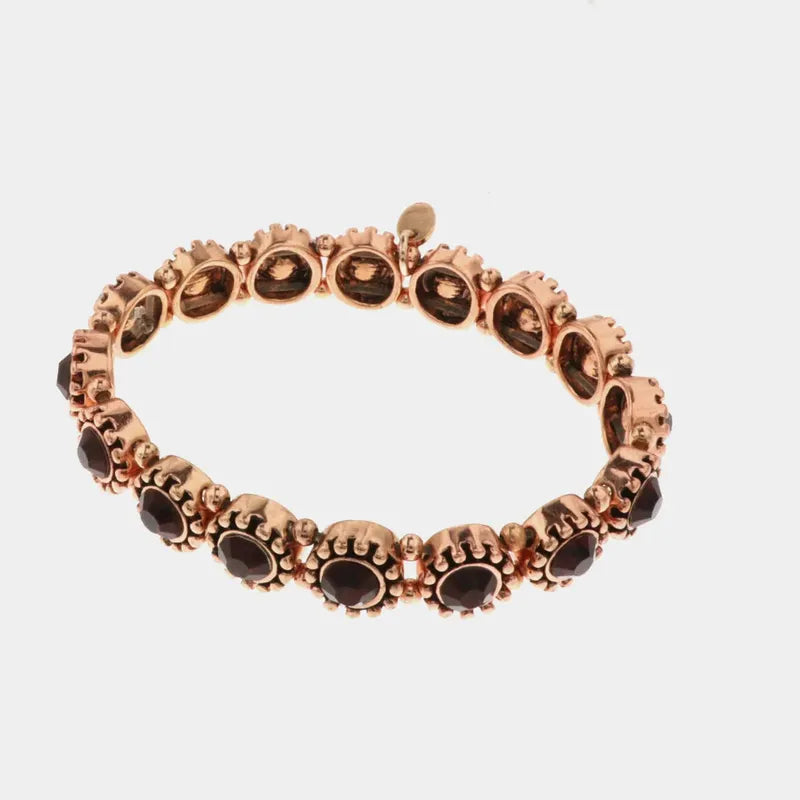 Bracciale in Metallo elastico, con cristalli marrone