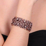 Bracciale in Metallo elastico, con fiori e cristalli