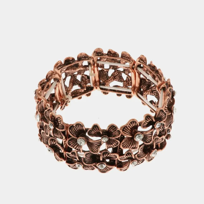 Bracciale in Metallo elastico, con fiori e cristalli