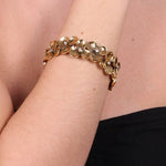 Bracciale in Metallo elastico, con fiori e cristalli