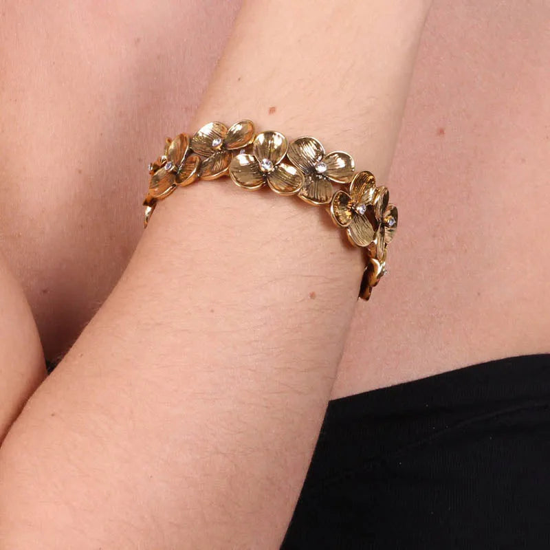 Bracciale in Metallo elastico, con fiori e cristalli