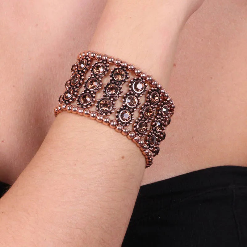 Bracciale in Metallo elastico con cristalli marroni