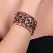 Bracciale in Metallo elastico con cristalli marroni