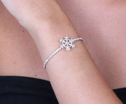 Bracciale in Metallo semirigido con cristalli e fiocco neve