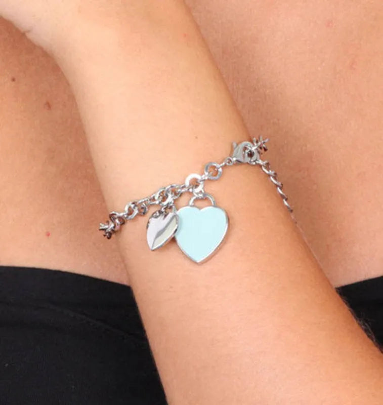 Bracciale in Metallo con cuore pendente in smalto verde