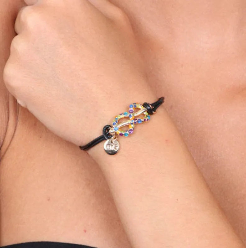 Bracciale in Metallo in caucciu, con simbolo infinito impreziosito da cristalli multicolore - BYSIMON gioielli