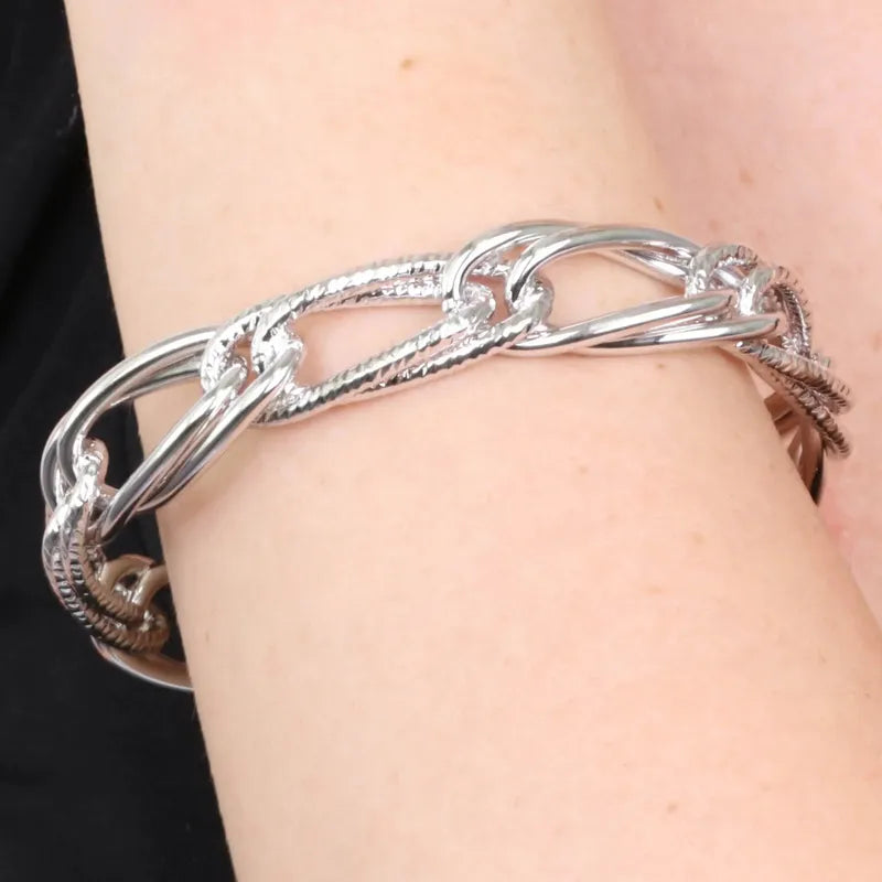 Bracciale in Metallo rigido stile schiava con anelli ad intreccio
