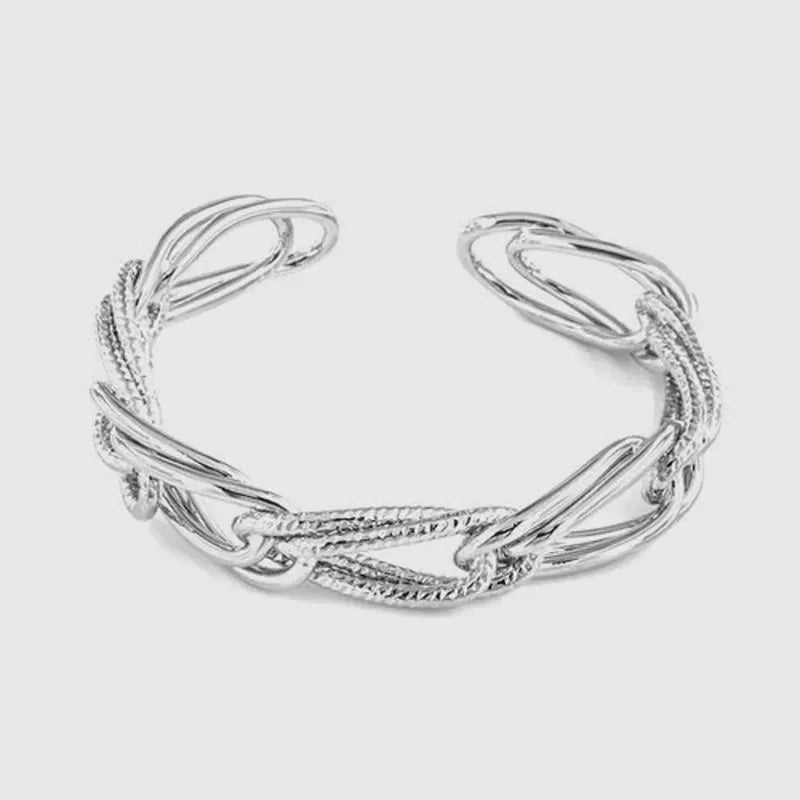 Bracciale in Metallo rigido stile schiava con anelli ad intreccio