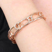 Bracciale in Metallo rigido stile schiava con anelli ad intreccio