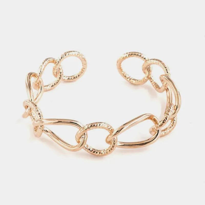 Bracciale in Metallo rigido stile schiava con anelli ad intreccio