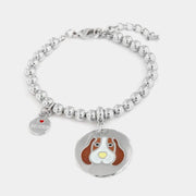 Bracciale in Metallo  con medaglia simbolo cane impreziosito da smalti colorati