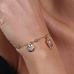 Bracciale in Metallo con campanella portafortuna pendente, impreziosita da punto luce - BYSIMON gioielli