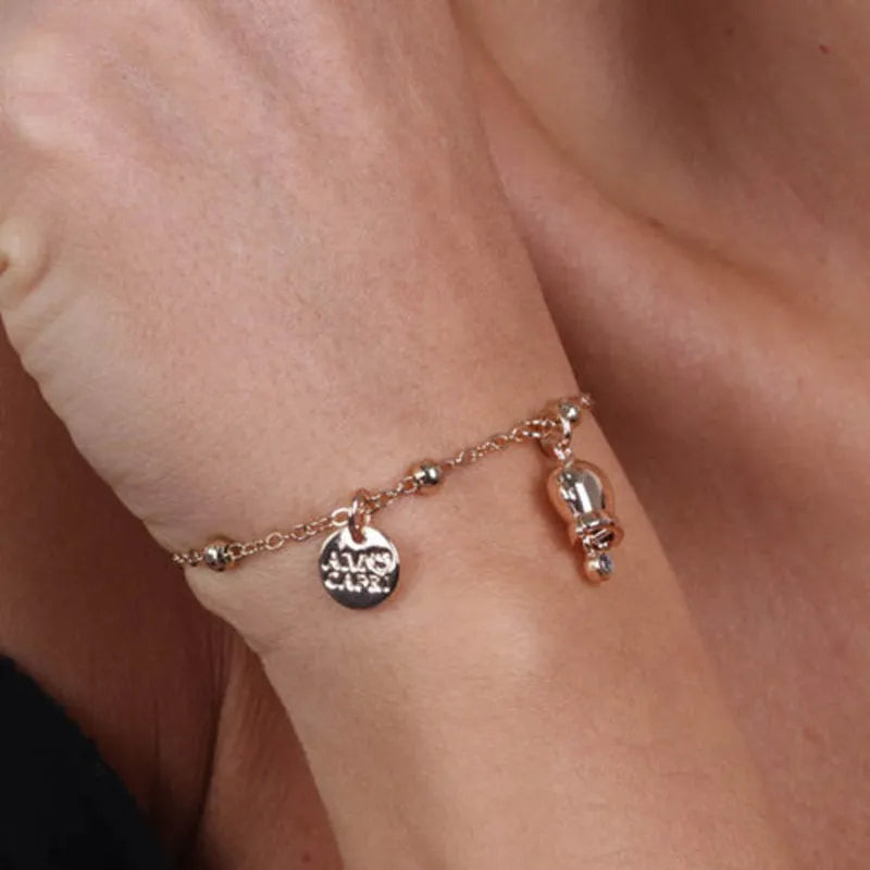 Bracciale in Metallo con campanella portafortuna pendente, impreziosita da punto luce - BYSIMON gioielli