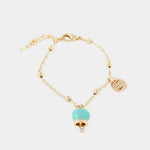 Bracciale in Metallo con campanella portafortuna pendente, impreziosita da smalto verde e punto luce - BYSIMON gioielli