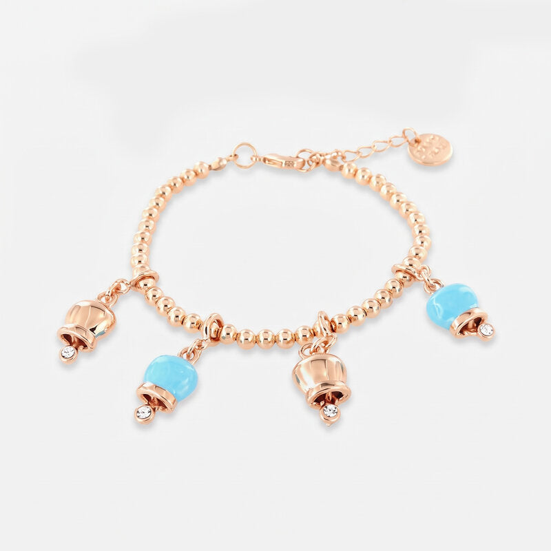 Bracciale in Metallo maglia sfere, con ciondoli campanelle portafortuna, impreziosite da smalto turchese e cristalli - BYSIMON gioielli