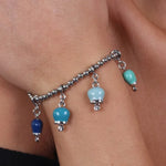 Bracciale in Metallo con quattro campanelle nelle gradazioni del blu - BYSIMON gioielli