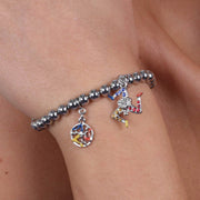 Bracciale in Metallo maglia a sfere con trinacria pendente impreziosita da cristalli multicolore