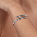 Bracciale in Metallo a contrariè rigido regolabile