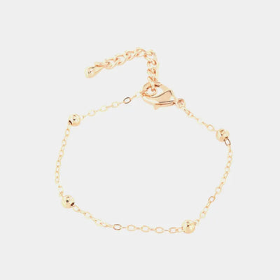 Metal chain bracelet with beads