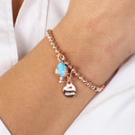 Bracciale pumo pugliese pendente azzurro rosè | pumo portafortuna pugliese | BYSIMON