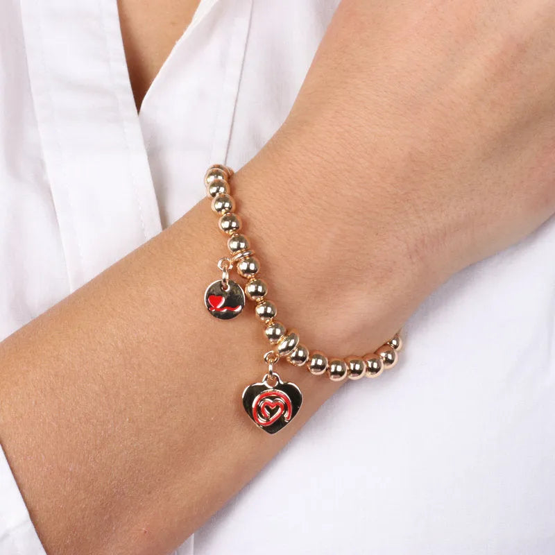 Bracciale in Metallo maglia a sfere, con con cuori pendenti in smalto rossopendenti - BYSIMON gioielli
