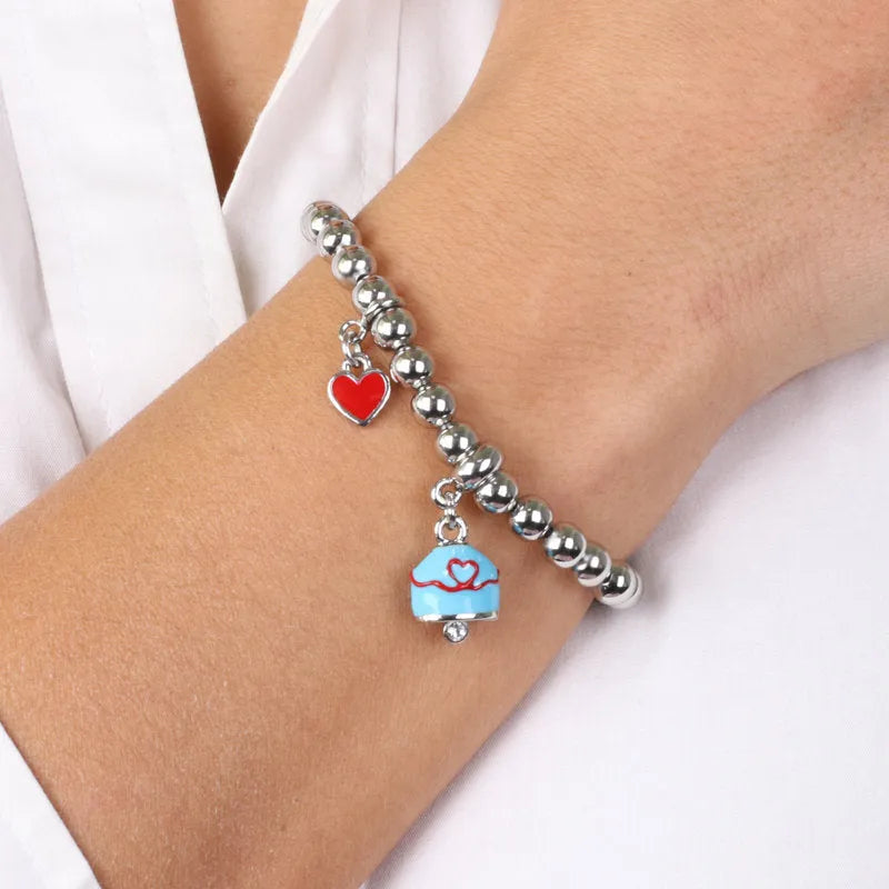 Bracciale in Metallo con campanella turchese e filo rosso con cuore