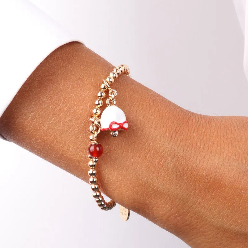 Metal bracelet with Christmas bell pendant