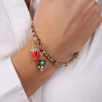 Bracciale in Metallo con ciondoli portafortuna, campanella smaltata verde e corno in smalto rosso - BYSIMON gioielli