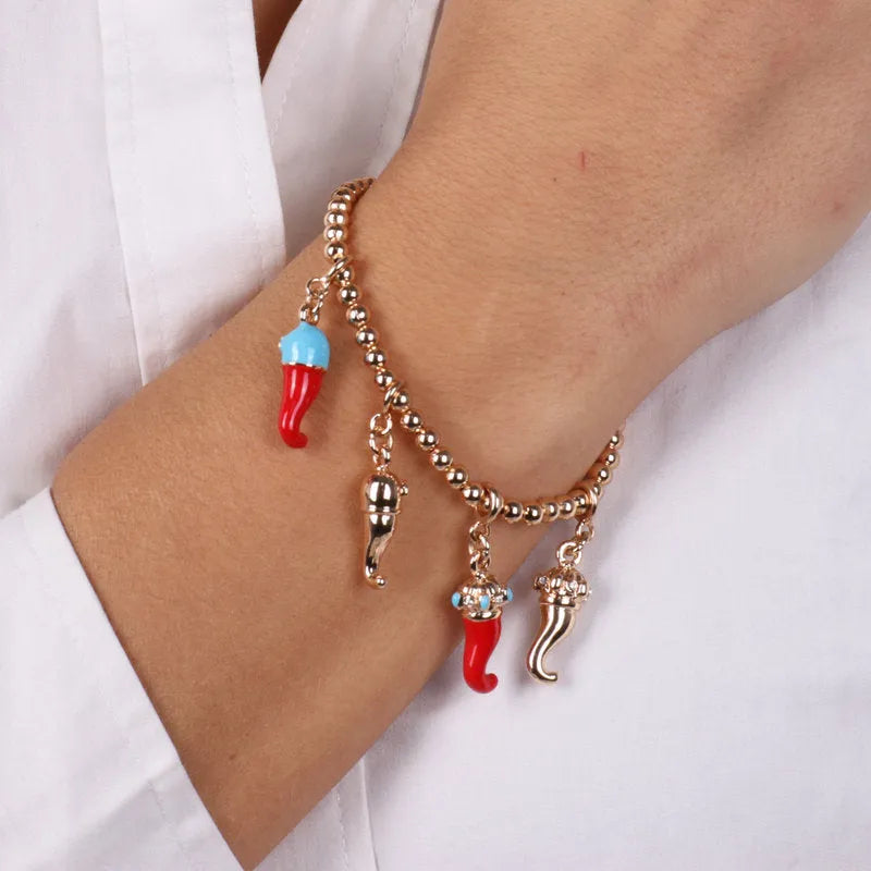 Bracciale in Metallo con cornetti portafortuna pendenti, impreziositi da smalti colorati - BYSIMON gioielli