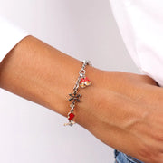 Bracciale in Metallo con fiocco di neve, cuore rosso e campanella portafortuna