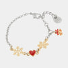Bracciale in Metallo con fiocco di neve, cuore rosso e campanella portafortuna
