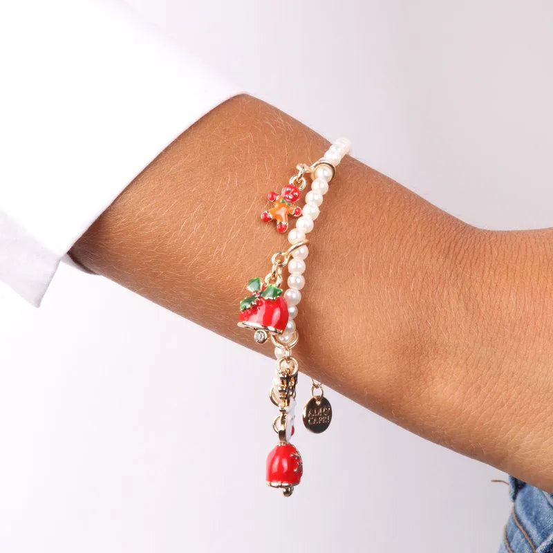 Metal bracelet with hanging Christmas charms