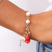 Bracciale in Metallo con perle, foglie e campanella a forma di rosa impreziosita da smalti colorati